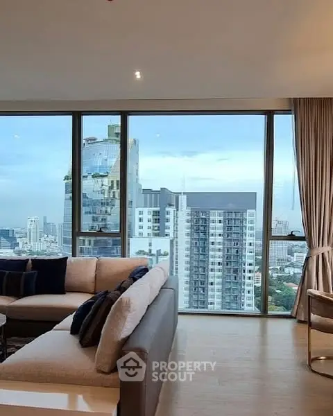 Luxurious living room with stunning city view and modern furnishings