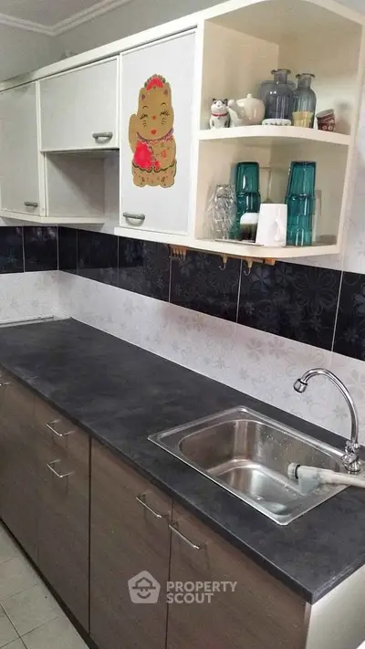 Modern kitchen with sleek countertops and stylish cabinetry