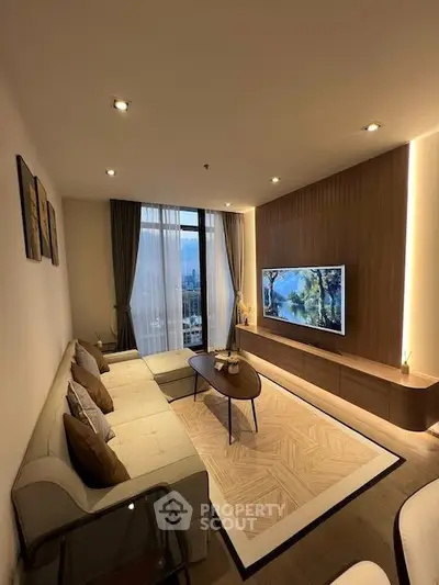 Modern living room with stylish decor and city view, featuring a cozy sofa and wall-mounted TV.