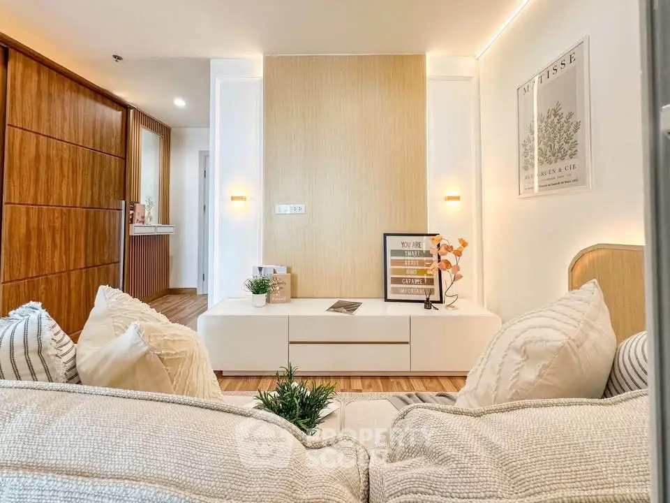 Modern living room with cozy decor and stylish furniture in a contemporary apartment.
