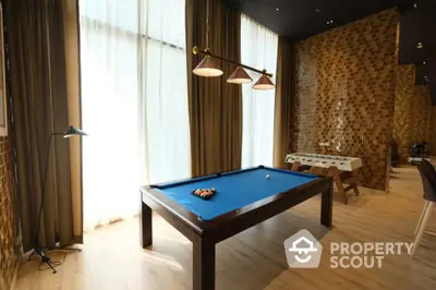 Luxurious game room with pool table and stylish decor