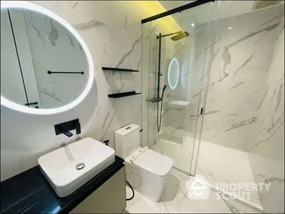 Luxurious modern bathroom with elegant marble tiles and sleek fixtures