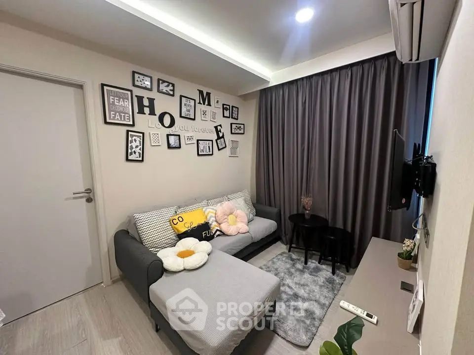Cozy living room with stylish decor and comfortable seating in modern apartment.