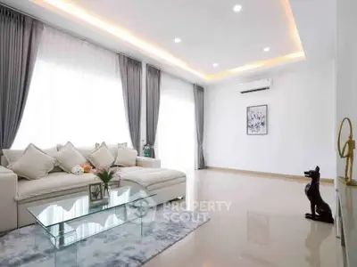 Spacious modern living room with elegant decor and natural light
