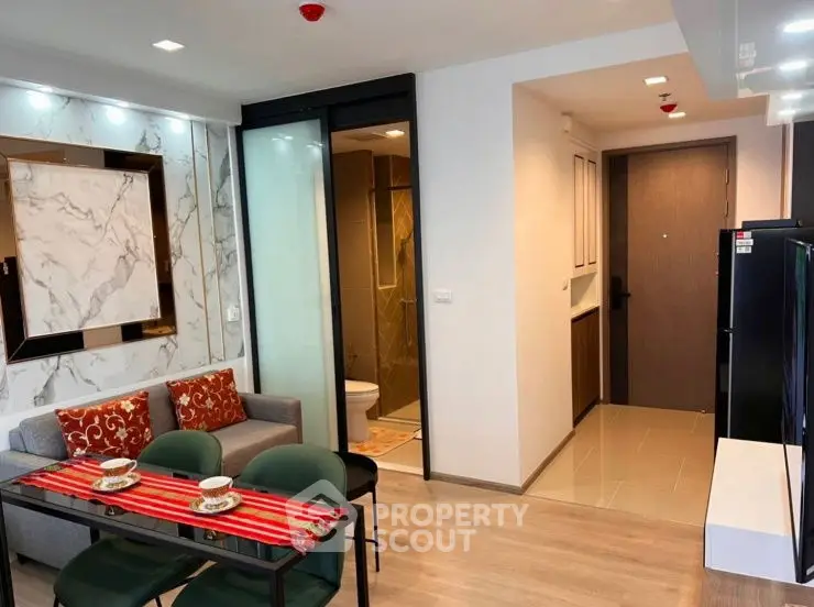 Modern open layout living room with dining area and stylish decor