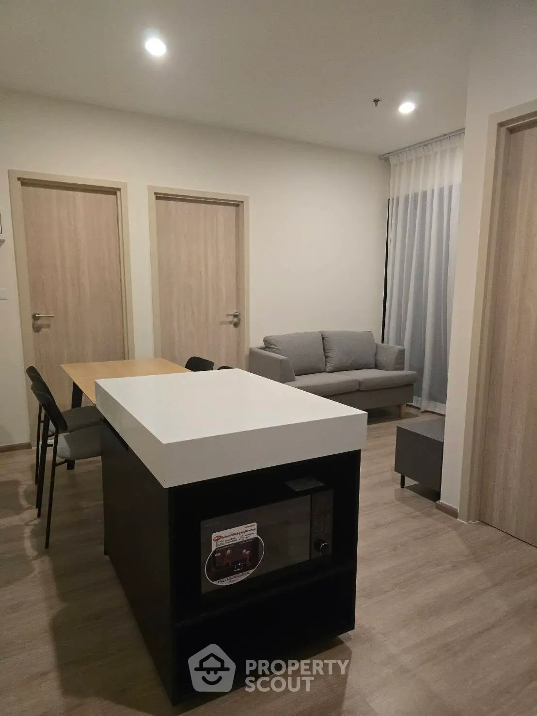 Modern living room with sleek furniture and open layout