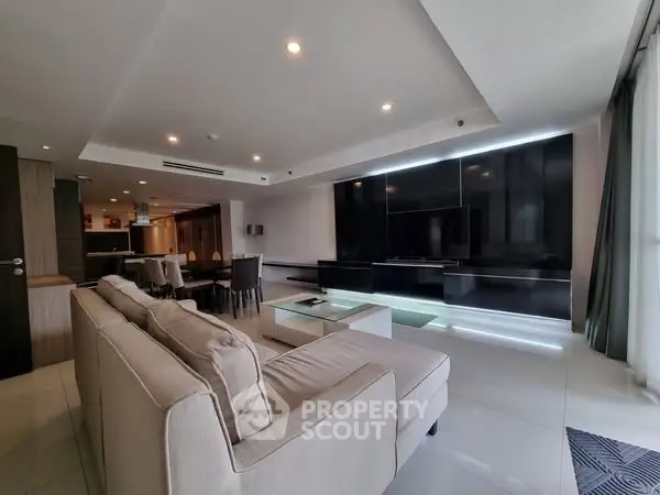Spacious modern living room with sleek design and elegant furniture
