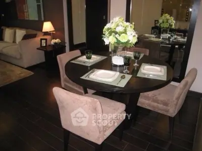 Elegant dining area with stylish decor and cozy seating in modern apartment