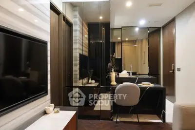 Modern interior with sleek design, featuring a stylish desk and wall-mounted TV in a cozy living space.