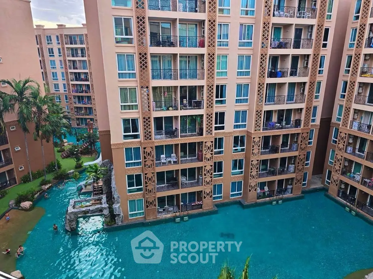 Luxurious apartment complex with stunning pool and garden view