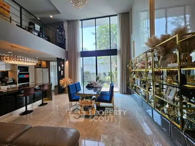 Luxurious modern living room with high ceilings and elegant decor