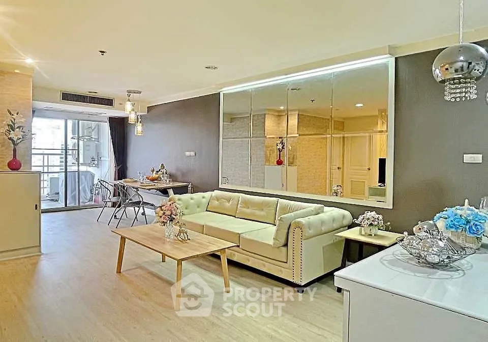 Spacious modern living room with elegant decor and open layout in a stylish apartment.