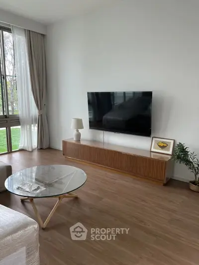 Modern living room with sleek TV setup and elegant decor