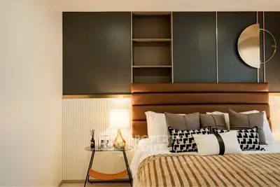 Luxurious modern bedroom with stylish decor and ambient lighting