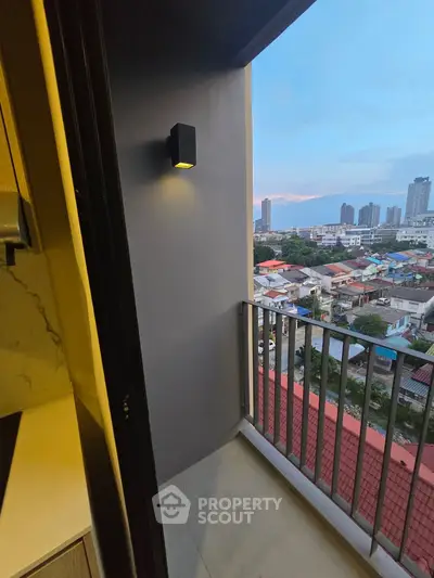 Charming balcony with city view, perfect for relaxation and enjoying the skyline.