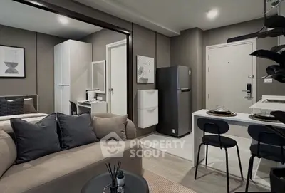 Modern studio apartment with open layout, featuring cozy living area and sleek kitchen.