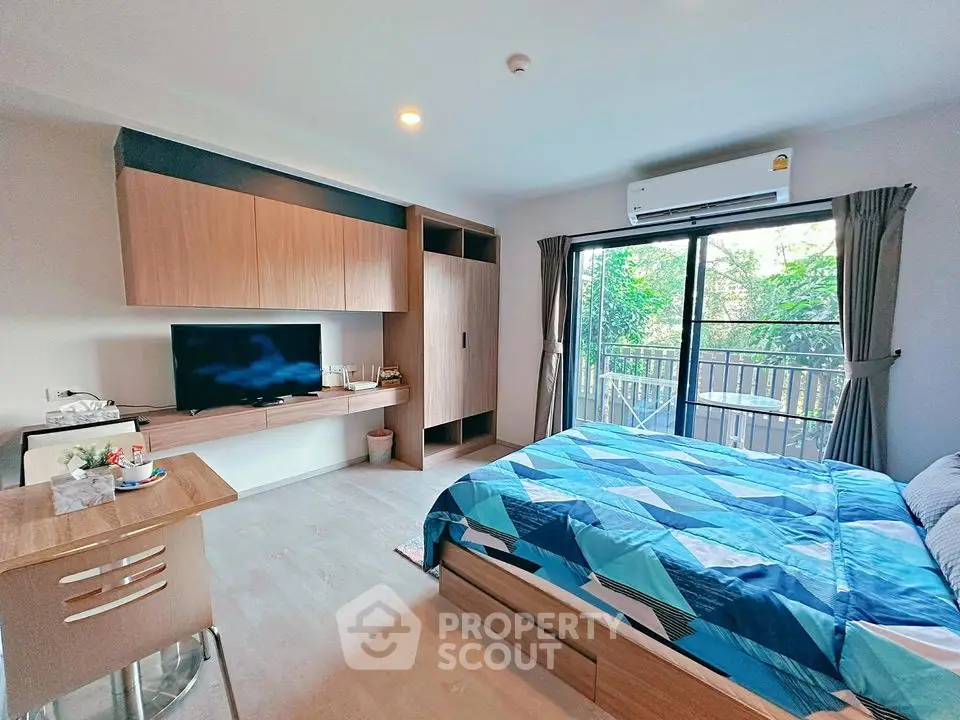 Modern bedroom with balcony view and stylish decor