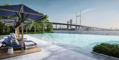 Luxurious poolside view with city skyline and bridge in the background, perfect for relaxation.