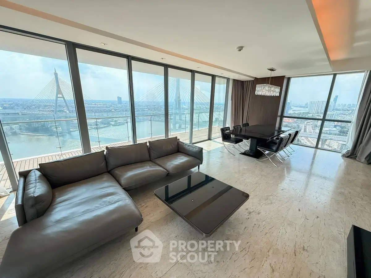 Luxurious living room with panoramic city views and modern furnishings
