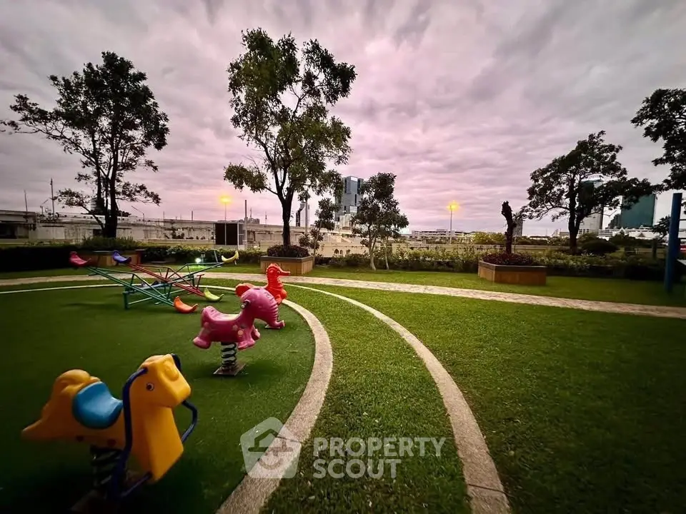 Charming playground with vibrant equipment and lush greenery, perfect for family-friendly residential communities.