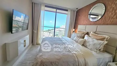 Luxurious bedroom with stunning ocean view and elegant decor