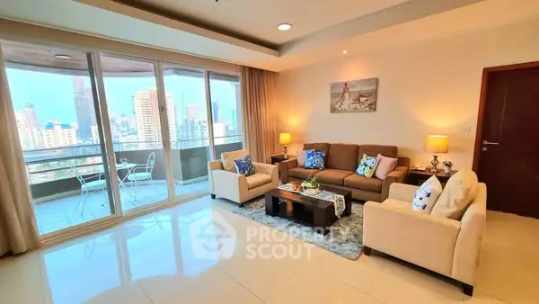 Spacious living room with city view and balcony access in modern apartment.