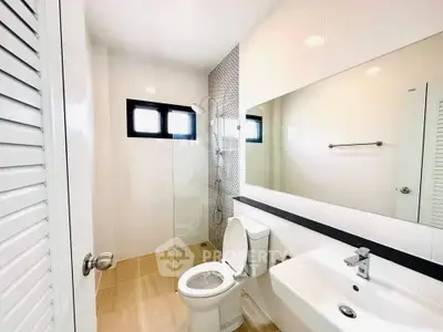 Modern bathroom with sleek fixtures and natural light