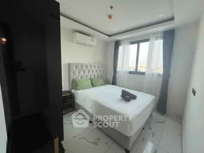 Modern bedroom with elegant design and city view window