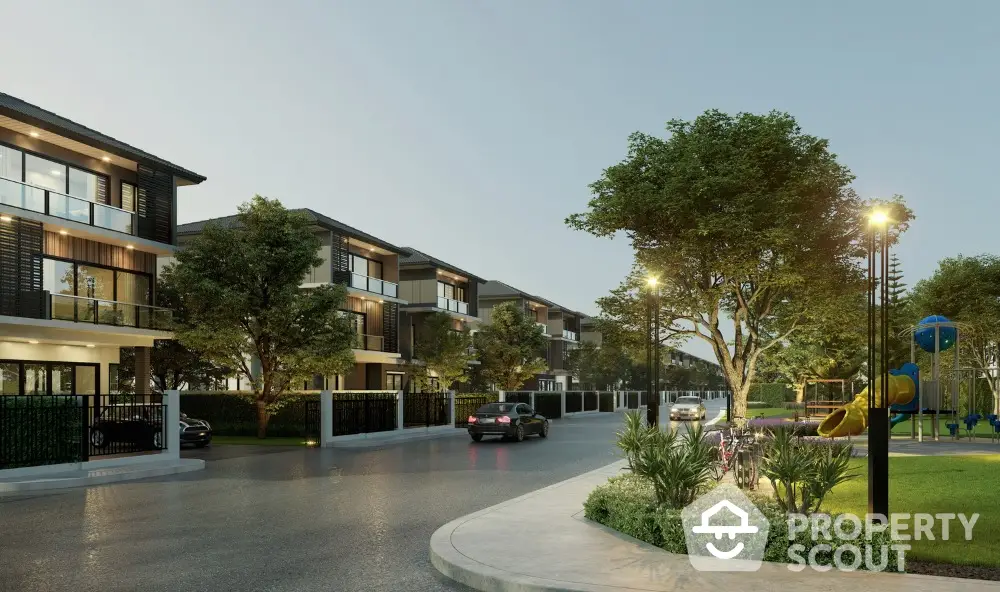 Luxurious modern residential street with lush greenery and elegant homes at dusk.