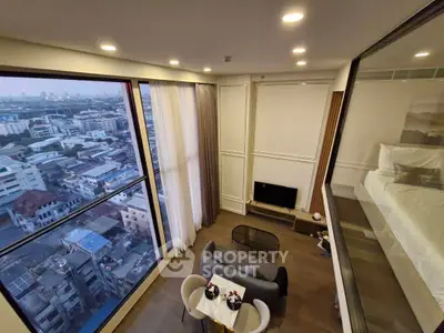 Luxurious high-rise apartment with stunning city view and modern interior design.