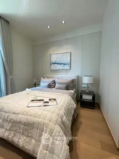 Cozy bedroom with elegant decor and soft lighting