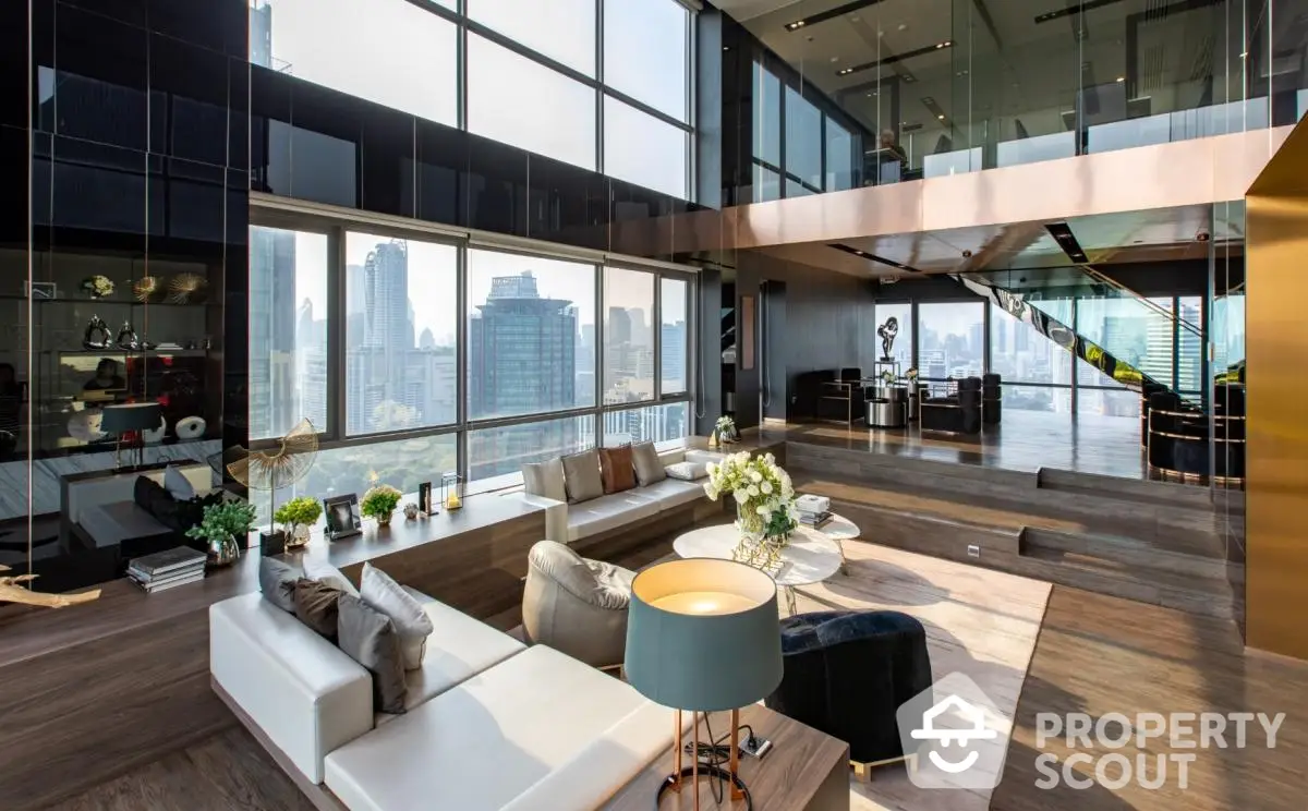 Luxurious high-rise living room with floor-to-ceiling windows offering a panoramic city view, modern furniture, and elegant interior design.