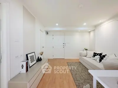 Modern living room with cozy sofa and stylish decor