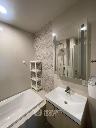 Modern bathroom with sleek fixtures and stylish tile design