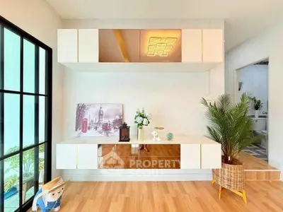 Modern living room with stylish decor and wooden flooring