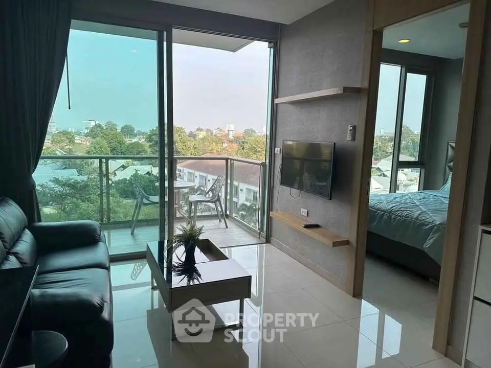 Modern living room with balcony and scenic view in stylish apartment