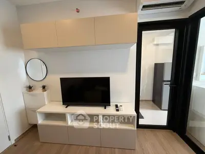 Modern living room with sleek TV unit and stylish decor