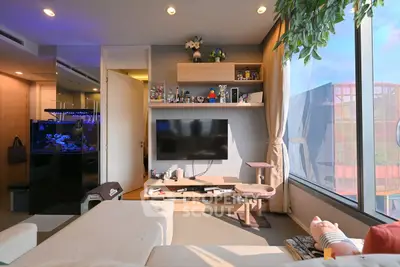 Modern living room with large windows and stylish decor