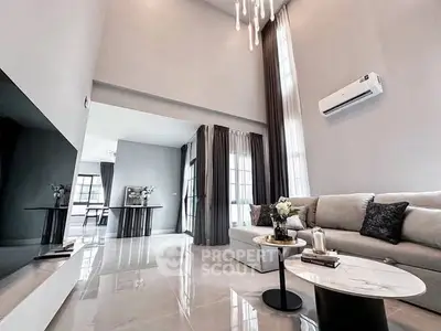 Luxurious modern living room with high ceilings and elegant decor