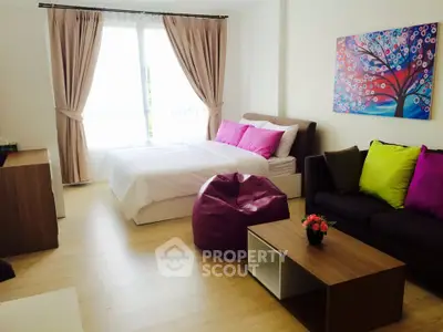 Modern studio apartment with stylish decor and natural light