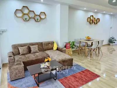 Modern living room with stylish decor and cozy furniture, perfect for relaxation and entertaining guests.