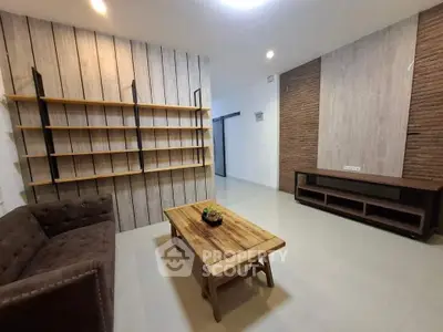 Modern living room with rustic wooden shelves and cozy seating area