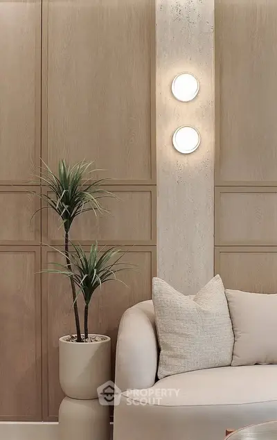 Elegant modern living room with stylish lighting and cozy seating