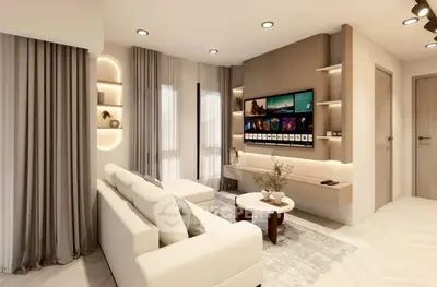 Modern living room with sleek design, featuring a large TV, cozy seating, and elegant lighting.
