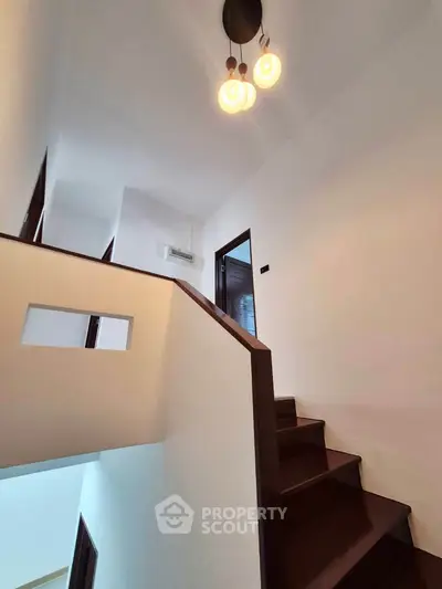 Modern staircase with elegant lighting in a contemporary home interior