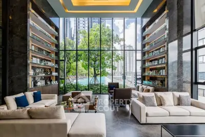Luxurious living room with floor-to-ceiling windows and stunning city view