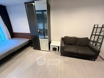 Modern studio apartment with sleek design and cozy furnishings