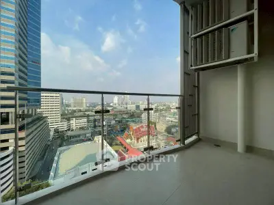 Spacious balcony with stunning city view in modern high-rise building