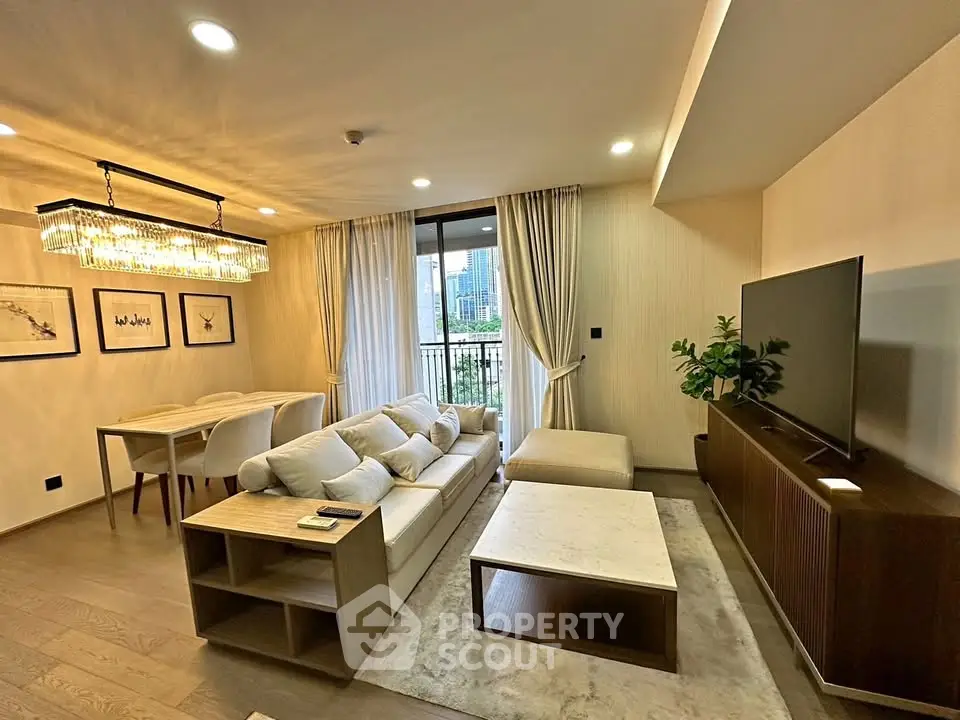 Luxurious living room with elegant decor and city view, featuring a spacious layout and modern furnishings.