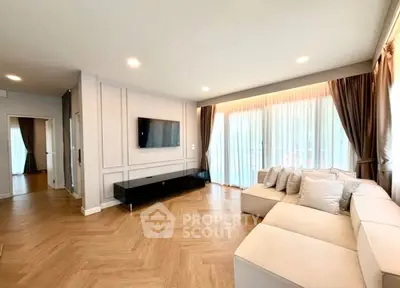 Spacious modern living room with elegant decor and natural light